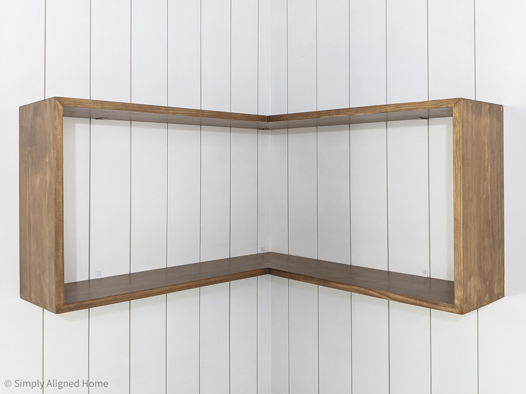 Woodcornerfloatingshelfboxinstalledovershiplap