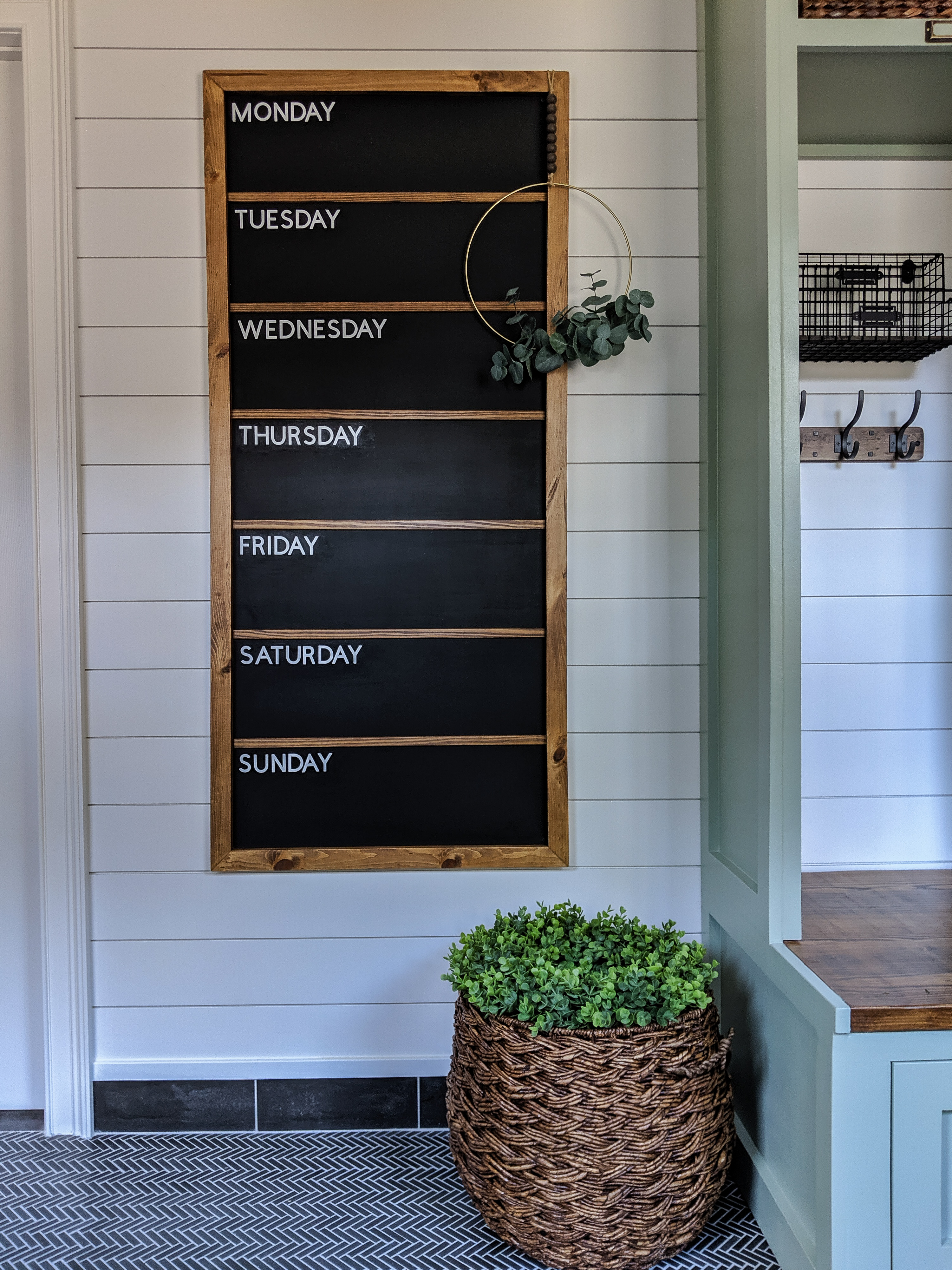 Mudroom-built-in-organizer-and-weekly-chalkboard