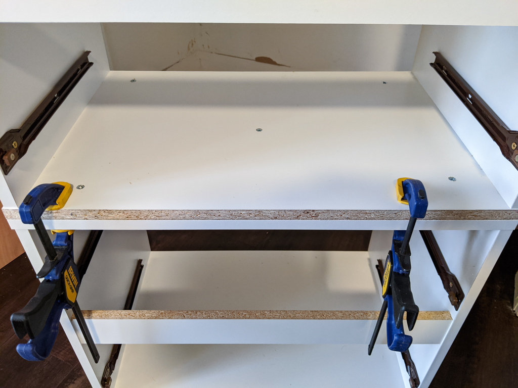 Secure-two-small-dressers-together-using-screws