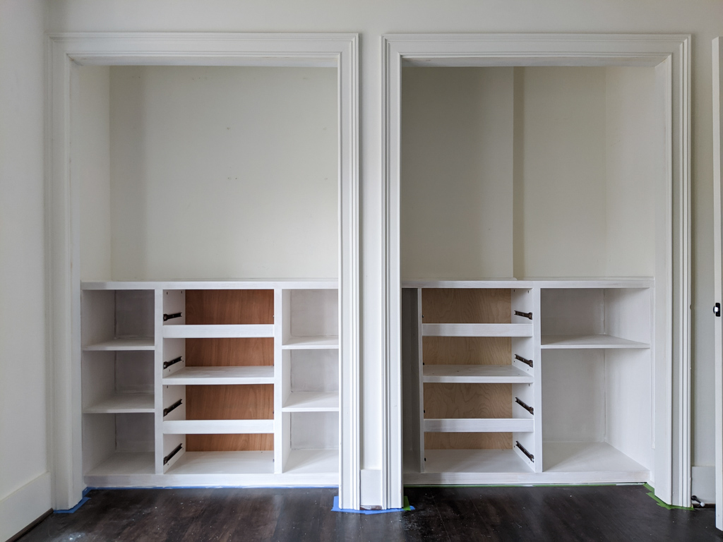 Small-closets-with-custom-units-painted-white