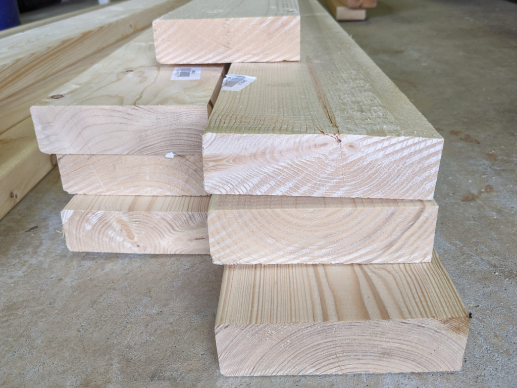 Raw-edge-and-ripped-edge-2x6-pine-wood