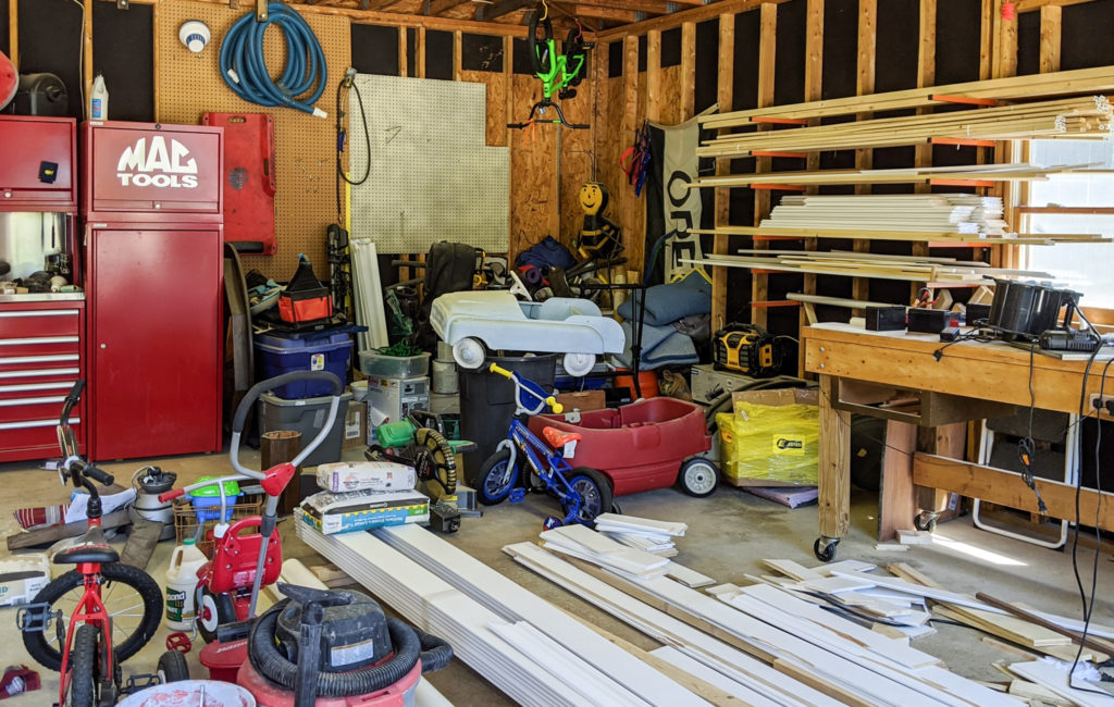 Messy-garage-in-need-of-organization-and-storage
