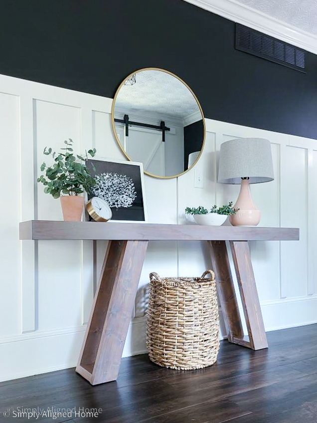 DIY-entryway-table-with-angled-legs-against-board-and-batten-wall