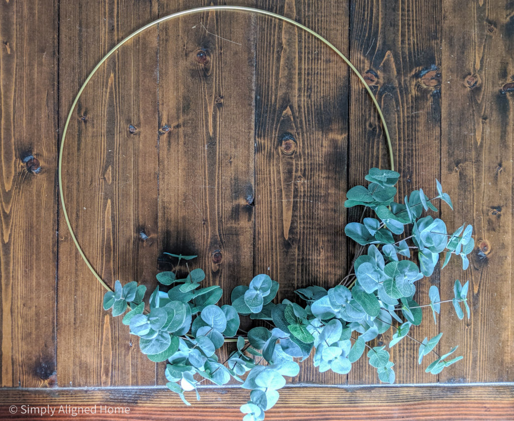 Stems-attached-to-metal-ring-with-hot-glue-for-modern-wreath