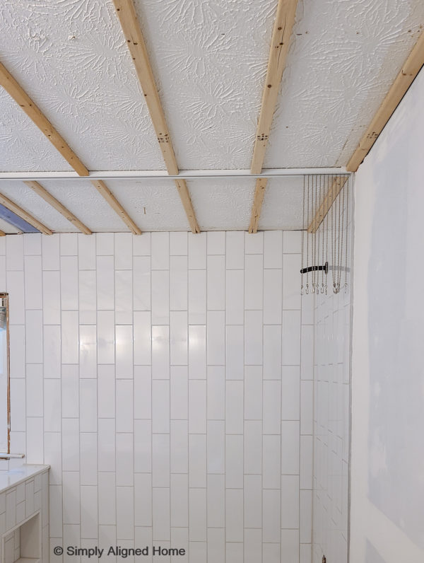 HOW TO INSTALL THE PERFECT BATHROOM CEILING SHIPLAP - Simply Aligned Home
