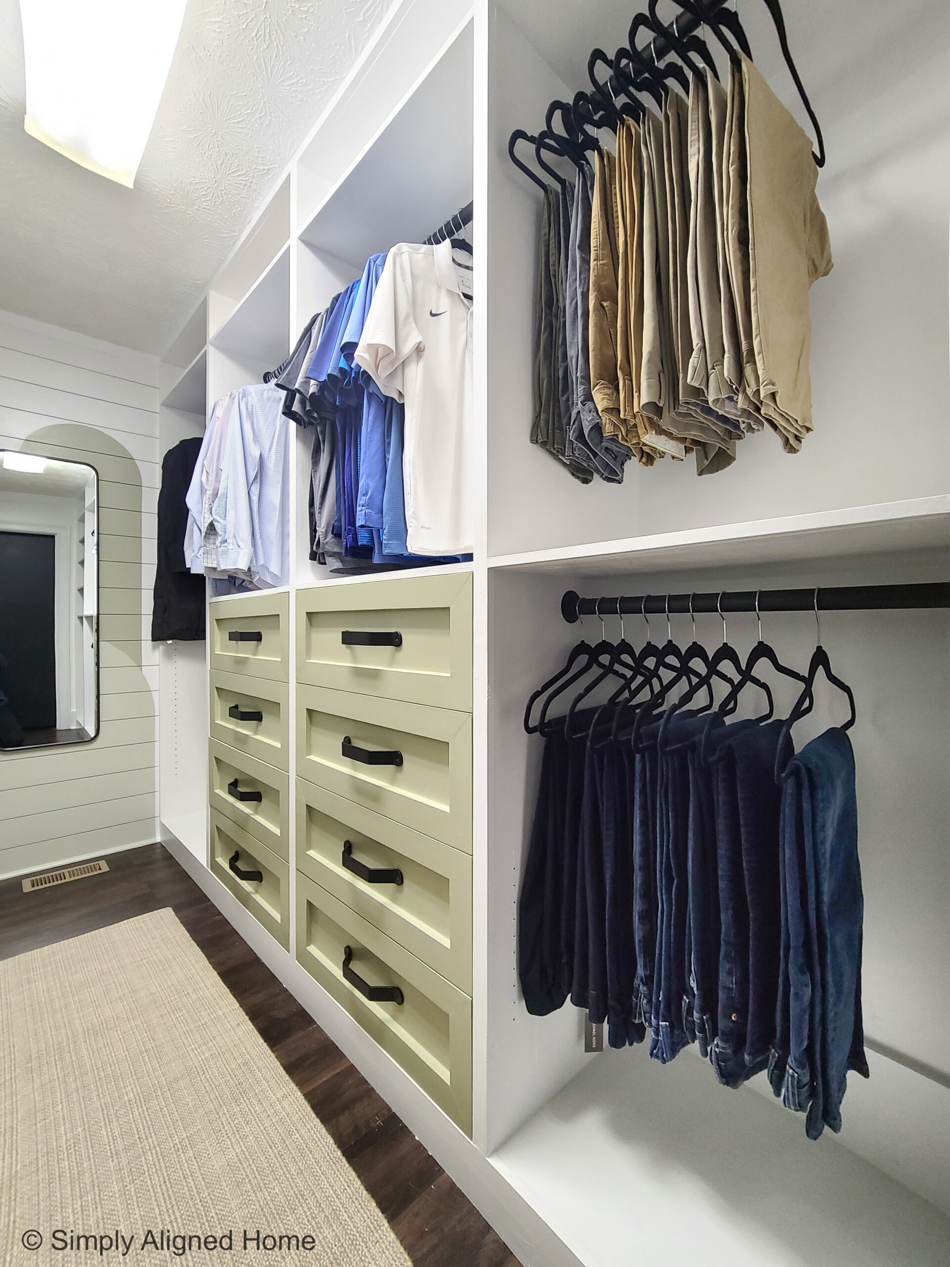 https://simplyalignedhome.com/wp-content/uploads/2022/05/Simply-Aligned-Home-Custom-Master-Closet-with-Extra-Hanging-Space-and-Built-In-Drawers-scaled.jpg