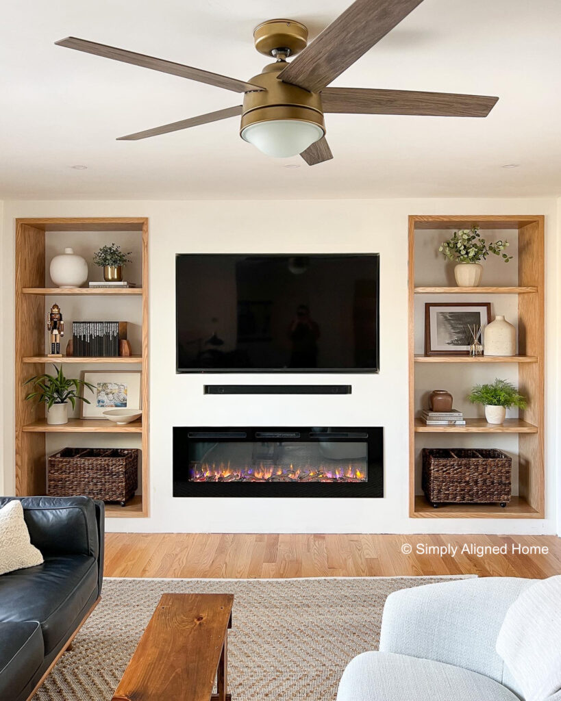 Built in wall units deals with fireplace and tv