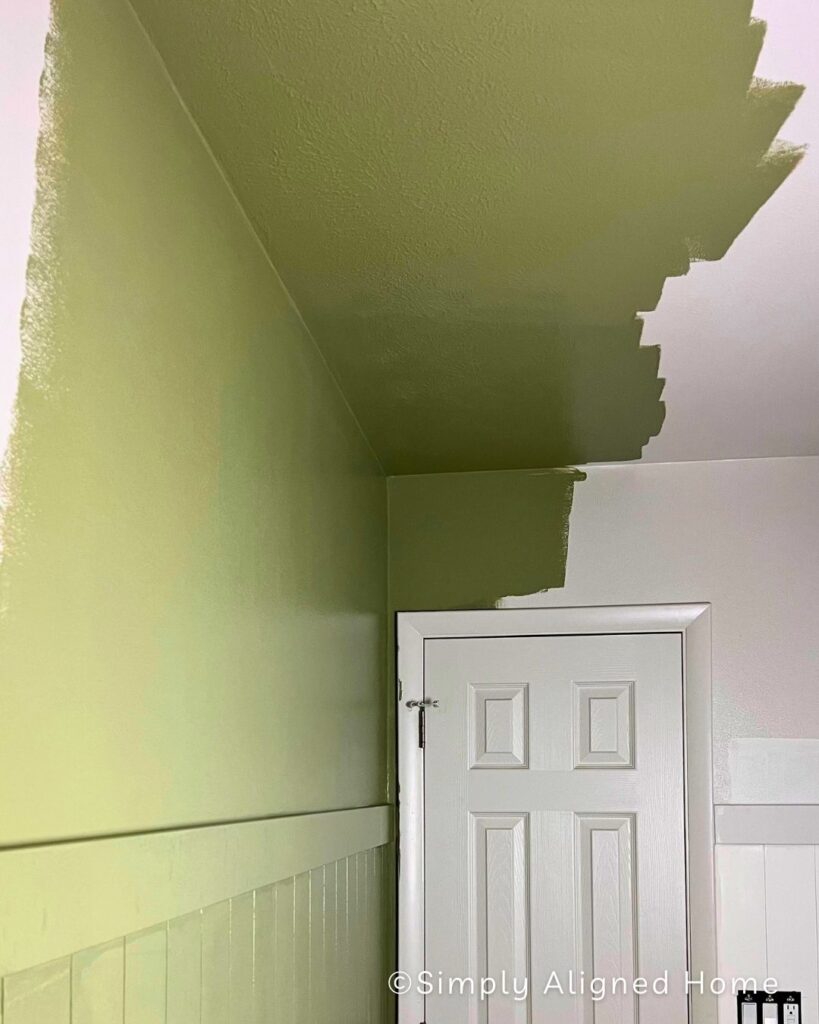 Painting the ceiling green.