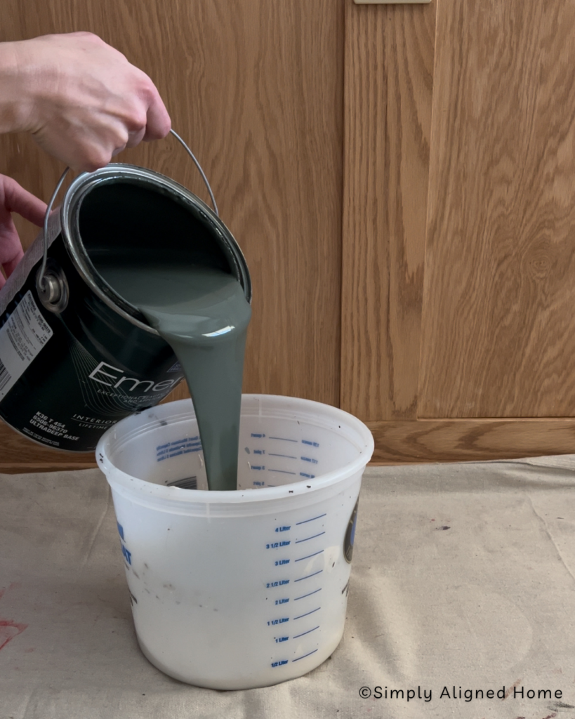Mixing the paint into the joint compound. 